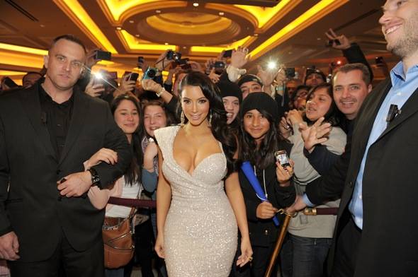 Kim-Kardashian-with-fans-at-Venetian-before-entering-TAO-Las-Vegas-photo-credit-Denise-Truscello.jpg