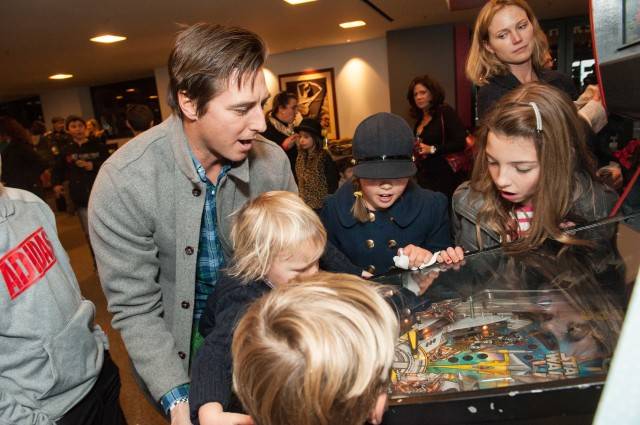 Jonny Moseley and kids enjoy some Holiday Heroes fun  Credit: Drew Altizer Photography