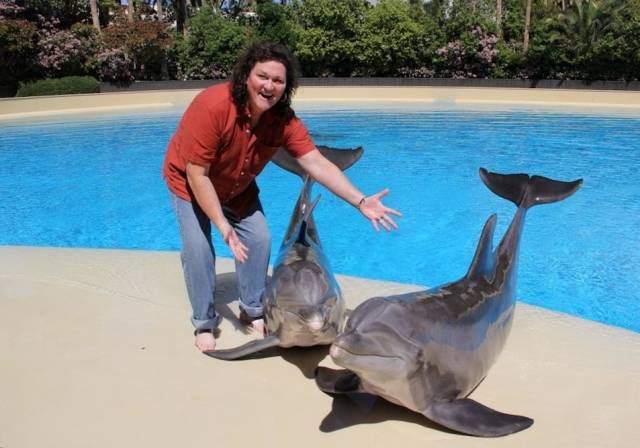 Dot Marie Jones with Dolphins Lightning and Osborne at Siegfried & Roy's Secret Garden and Dolphin Habitat at The Mirage - 3.31.14
