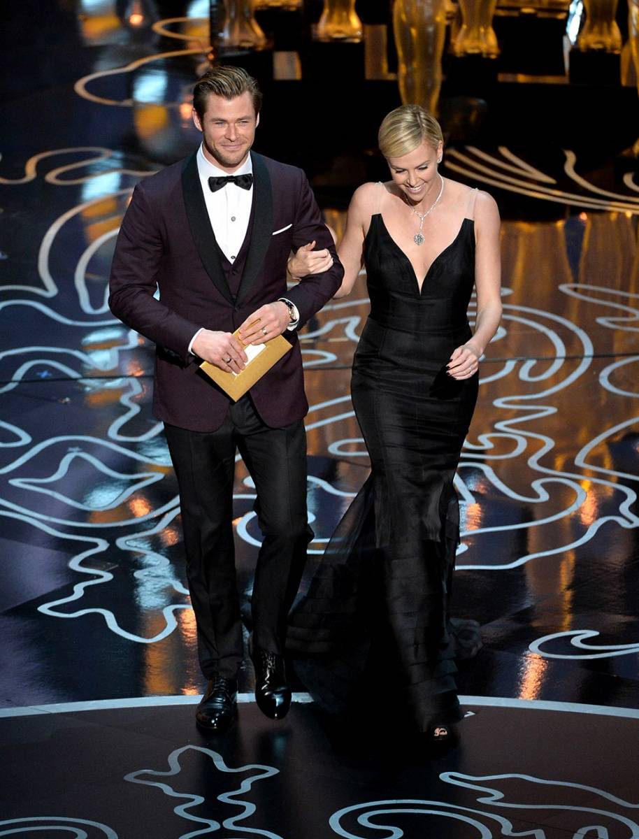 For Chris Hemsworth, David designed a deep black cherry dinner jacket with a black satin shawl lapel and satin trim worn over a white diamond bib tuxedo shirt and paired with a solid black tuxedo pant.
