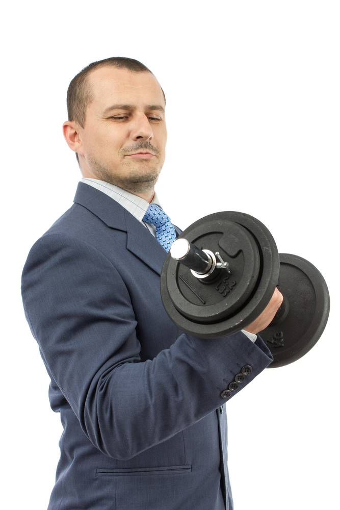 Businessman-lifts-weights