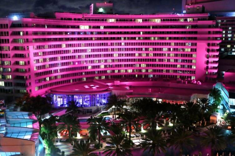 The Fontainebleau lit up in pink
