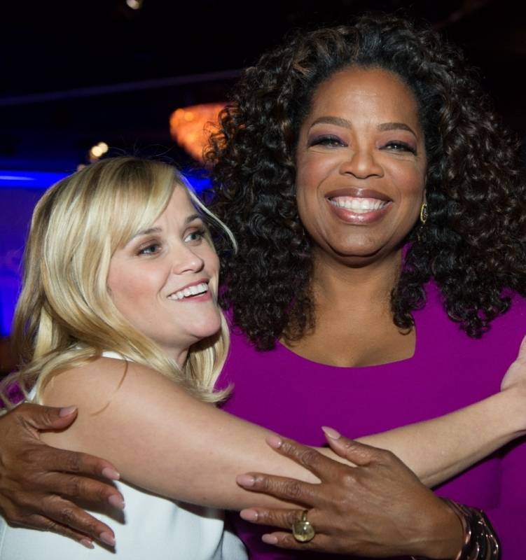 Reese Witherspoon and Oprah Winfrey hug it out 