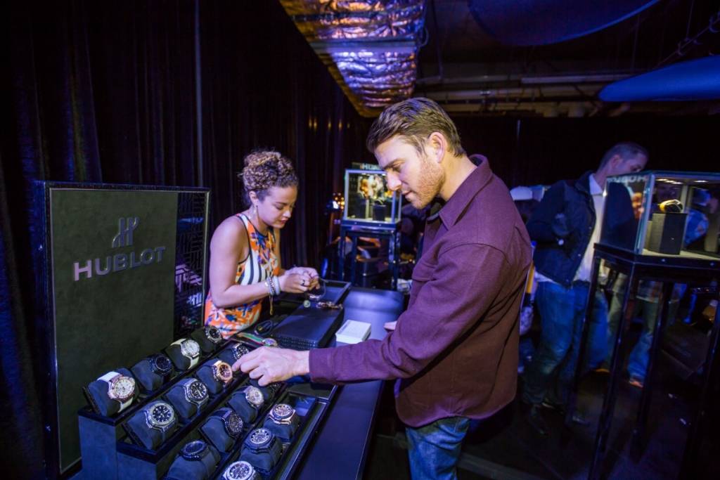 Bryan Greenberg trying on Hublot timepieces at the Hublot Shopping Event benefiting Lakers Youth Foundation