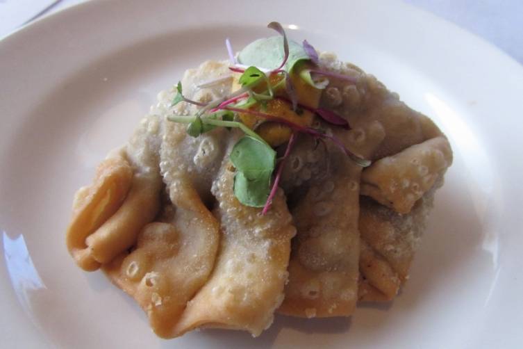 Smoked Bourbon Brisket Empanada with Aji Panca Tahini Sauce