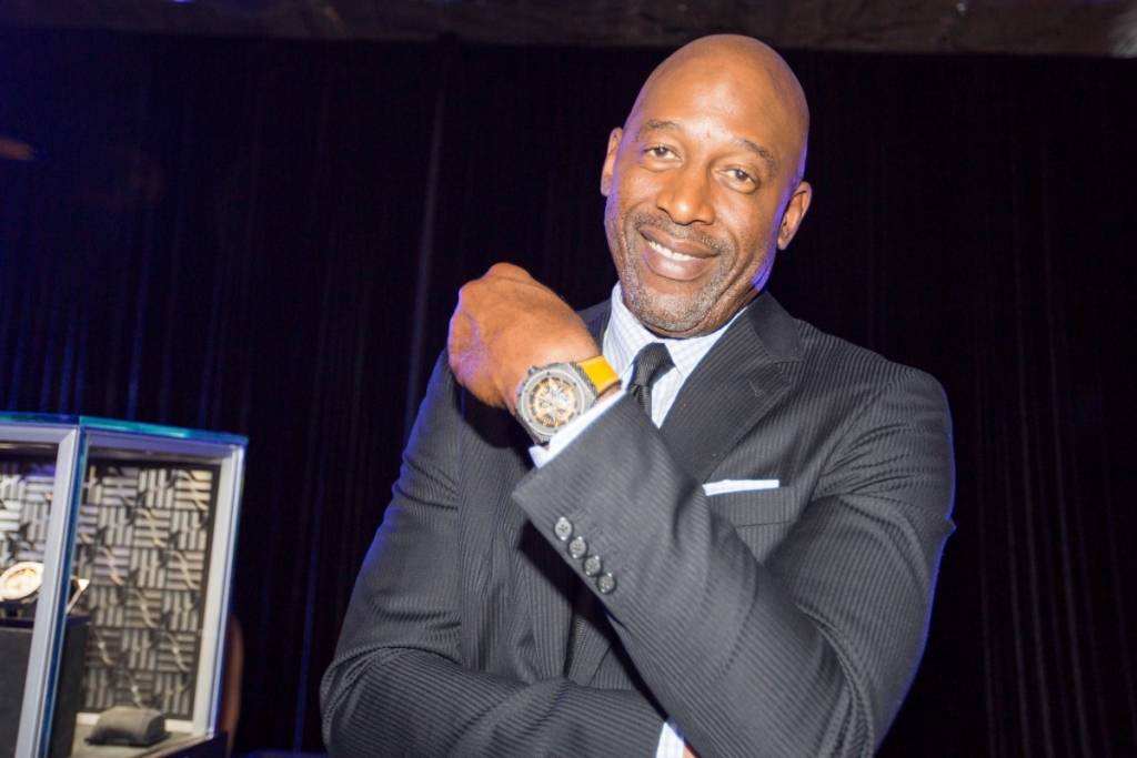 James Worthy showing off The King Power Los Angeles Lakers limited edition timepiece at the Hublot Shopping Event benefiting Lakers Youth Foundation