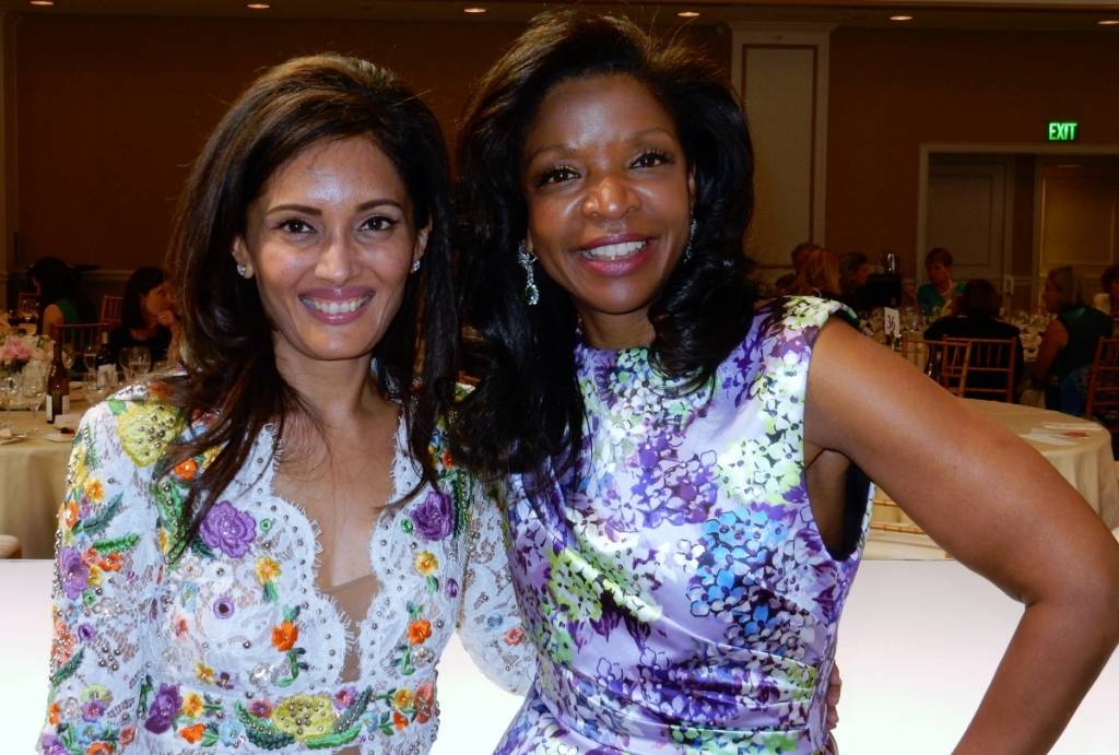 Komal Shah (in Emilio Pucci) and Pamela Joyner (in Andrew Gn)