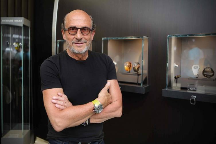 Richard Mille poses in Bal Harbour boutique