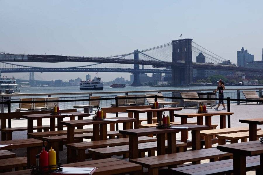Watermark Bar & Lounge Outdoor seating with views of the Brooklyn Bridge