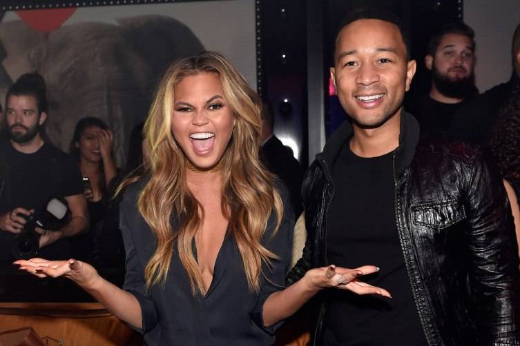 LAS VEGAS, NV - MAY 16:  Model Chrissy Teigen (L) and singer John Legend appear at 1 OAK Nightclub at The Mirage Hotel & Casino for a special Pre-Billboard Music Award celebration on May 16, 2015 in Las Vegas, Nevada.  (Photo by David Becker/WireImage) *** Local Caption *** Chrissy Teigen; John Legend