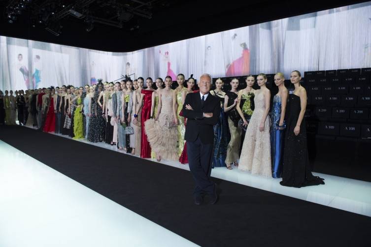 Giorgio Armani and his models