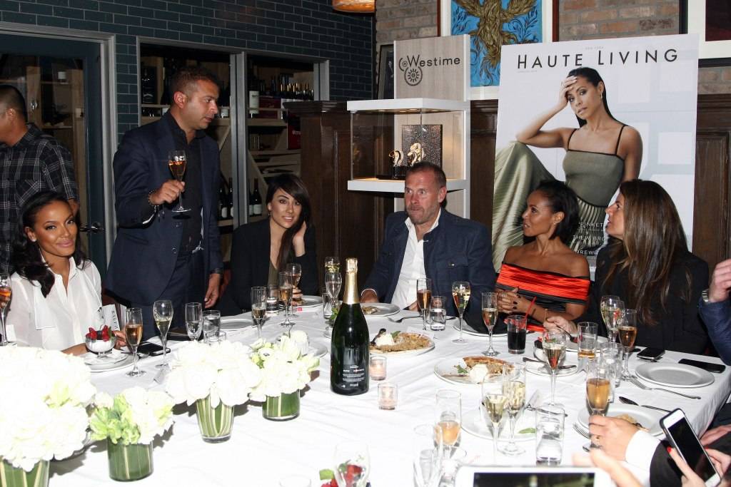 Haute Living publisher Kamal Hotchandai toasts Jada Pinkett Smith with model Selita Ebanks, Tina Thadani, photographer Don Flood and Karynne Tencer 