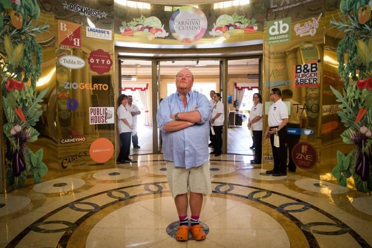 Chef Mario Batali stands at the entrance to the 7th Annual Carnival of Cuisine at the Palazzo.