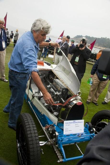 Year:1947, Make:Bugatti, Model:Type 37A, Style;2 Seat Sports, Owner:Jay Leno, Exhibit Year:2009, Notes:Jay Leno with his Bugatti