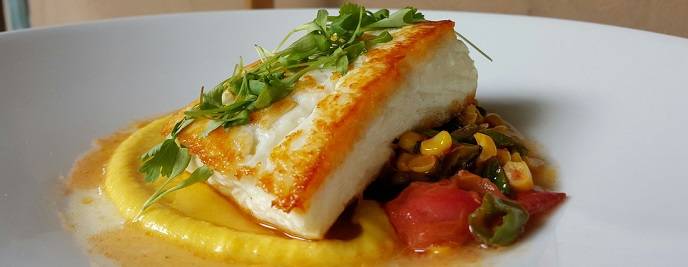 Halibut with corn, peppers and heirloom tomato
