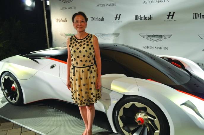 Olivia Hsu Decker next to Aston Martin DP 100