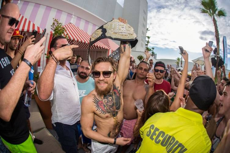 UFC superstar Conor McGregor celebrates his big win against rival Chad Mendes at Foxtail Pool inside SLS Las Vegas
