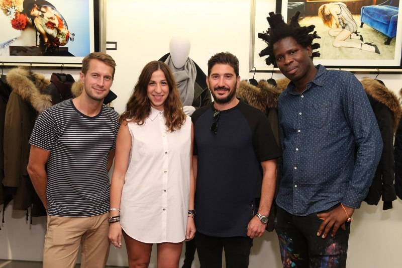 NEW YORK, NY - AUGUST 19:  (L-R) DJ Brendan Fallis, Mackage Co-Creative Directors Elisa Dahan and Eran Elfassy and artist and curator Bradley Theodore attend the Mackage X Bradley Theodore presenting "The Underground Artist" curated art exhibition at Mackage Soho on August 19, 2015 in New York City.  (Photo by Neilson Barnard/Getty Images for Mackage)