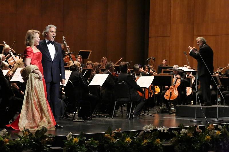 Renee Fleming and Andrea Bocelli and Placido Domingo onstage 