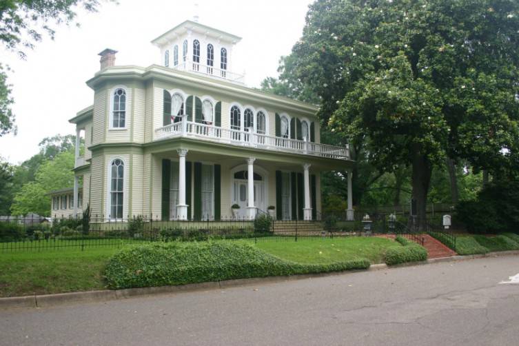 House of the Seasons is a beautiful Transitional Greek Revival built in 1872.