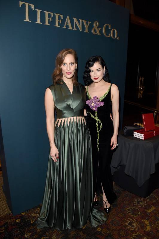 LOS ANGELES, CA - OCTOBER 09: Filmmaker/author Liz Goldwyn (L) and model Dita Von Teese attend the Tiffany & Co. celebration of Liz Goldwyn's "Sporting Guide" book launch at The Los Angeles Athletic Club on October 9, 2015 in Los Angeles, California. (Photo by Jason Merritt/Getty Images for Tiffany & co.)