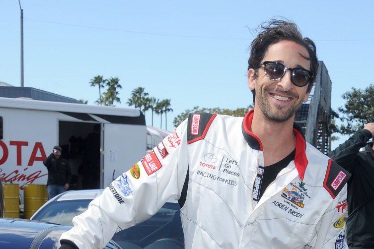 LONG BEACH, CA - APRIL 01: Actor Adrien Brody arrives at press day for the 2014 Toyota Pro/Celebrity Race on April 1, 2014 in Long Beach, California. (Photo by Gregg DeGuire/WireImage)