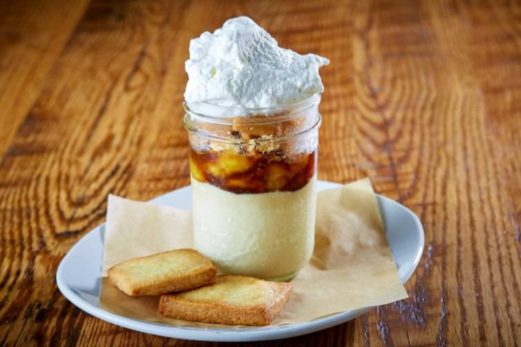 The butterscotch banana pudding is served in a jelly jar and made with whipped mascarpone.
