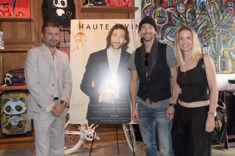 Kamal Hotchandani, Adrien Brody and Hadley Henriette attend Haute Living & Adrien Brody Cover Release Party at Lulu Laboratorium on December 3, 2015 in Miami, Florida. (Photo by Romain Maurice/Getty Images for Haute Living)