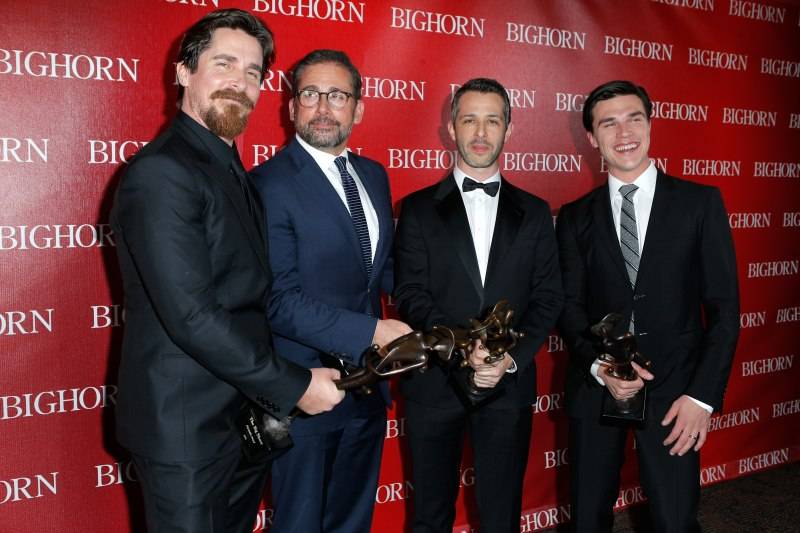 Christian Bale, Steve Carell, Jeremy Strong and Finn Wittrock pose with the Ensemble Performance Award for "The Big Short" during the 27th Annual Palm Springs International Film Festival 