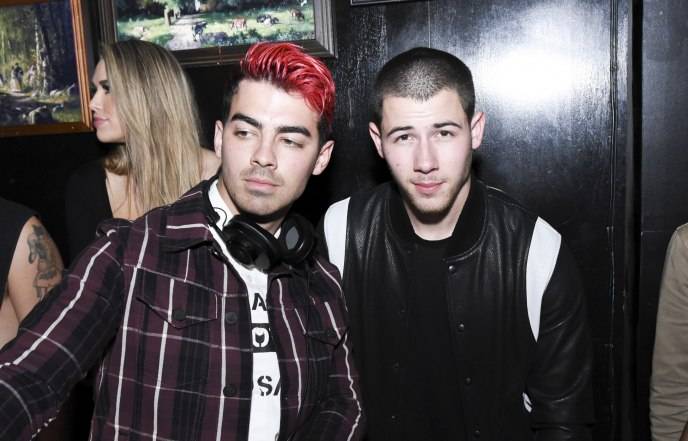 Joe Jonas and brother Nick Jonas attend day 1 of Lincoln Motor Company And Revel Present: The Sound of Luxury Experience at Henry's 
