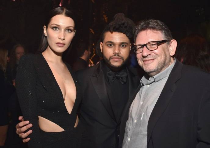 Model Bella Hadid, singer The Weeknd and CBE Chairman and CEO Lucian Grainge attend Universal Music Group 2016 Grammy After Party 