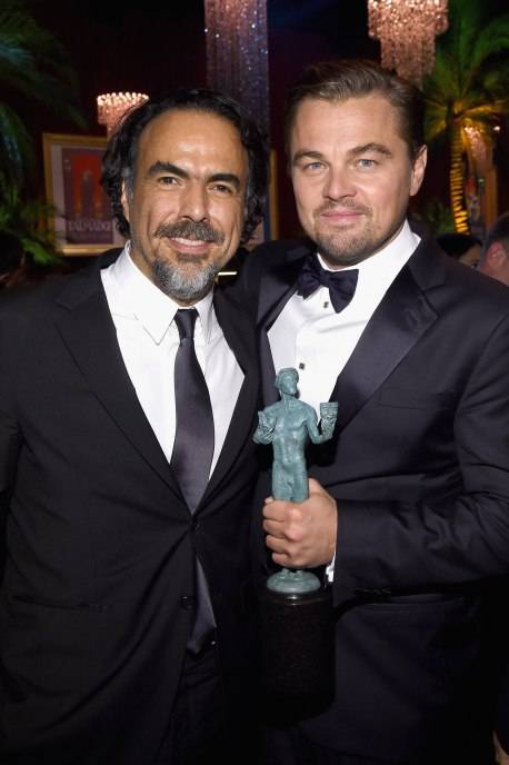 Director Alejandro G. Iñárritu (L) and actor Leonardo DiCaprio attend People and EIF's Annual Screen Actors Guild Awards Gala at The Shrine Auditorium on January 30