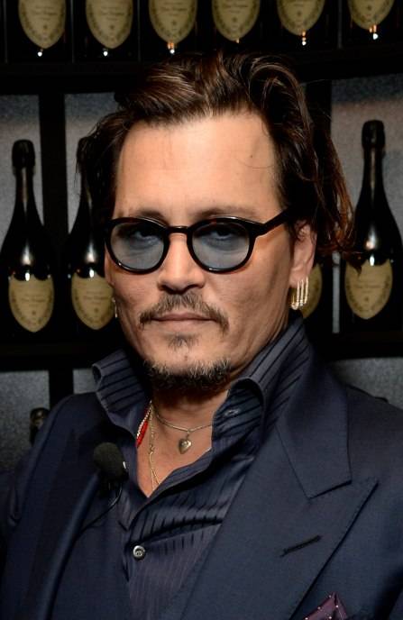 Johnny Depp visits the Dom Perignon Lounge before receiving the Maltin Modern Master Award at The Santa Barbara International Film Festival on February 4 