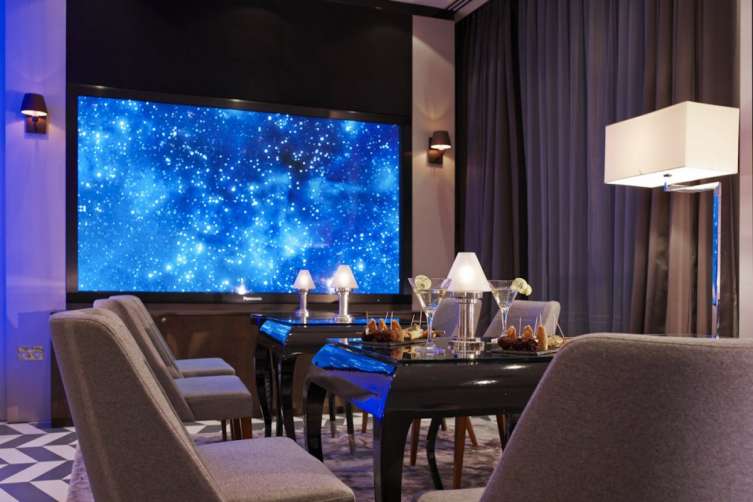the-hotels-ground-floor-media-lounge-features-a-massive-103-3dhd-cinema-screen-and-provides-complimentary-wi-fi-and-plentiful-ports