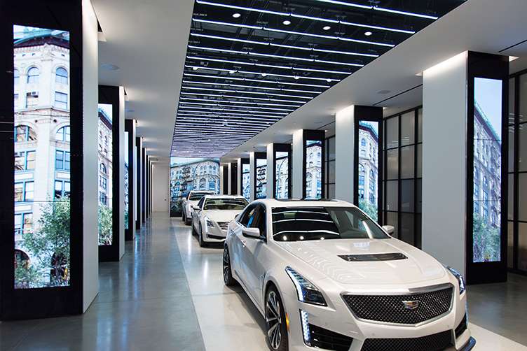 CTS-V, CT6, and XT5 vehicles will be stationed on the runway inside. Copyright Gensler