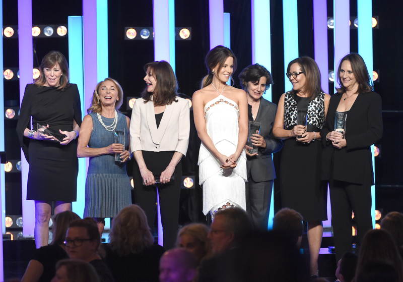 Actress Kate Beckinsale (C) poses with Crystal Award for Excellence in Film honorees (L-R) Jane Rosenthal, Lynda Obst, Lauren Shuler Donner, Lianne Halfon, Denise Di Novi, and Lucy Fisher 