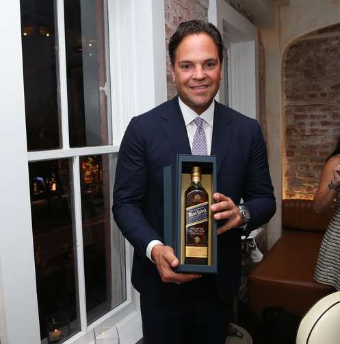 Mike Piazza with custom engraved bottle of Johnnie Walker Blue Label