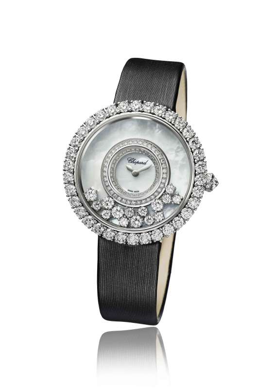 The 40th anniversary watch in 18-karat white gold with prong-set diamond bezel and 15 prong-set free-floating diamonds