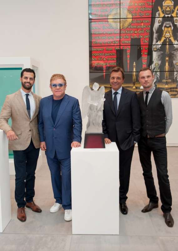 Maz Zouhairi with Elton John (both at left). Lalique collaborated with the singer for a special crystal collection that benefited the Elton John AIDS Foundation. with Elton John (both at left). Lalique collaborated with the singer for a special crystal collection that benefited the Elton John AIDS Foundation.