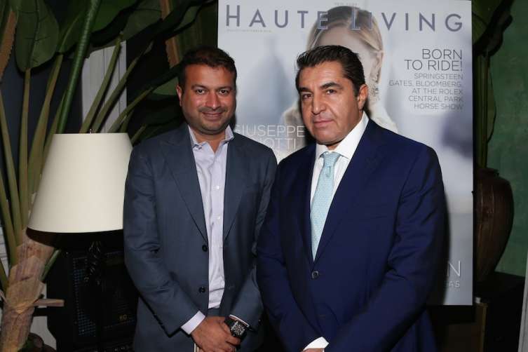 NEW YORK, NY - SEPTEMBER 27: Haute Living's CEO and Publisher Kamal Hotchandani (L) and Paolo Zampolli attend the Haute Living Celebrates Georgina Chapman with Perrier-Jouet and JetSmarter event at Socialista New York on September 27, 2016 in New York City. (Photo by Rob Kim/Getty Images for Haute Living)
