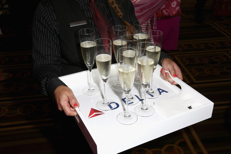 Champagne glasses on display during the "Breast Cancer One" dinner hosted by Delta Air Lines