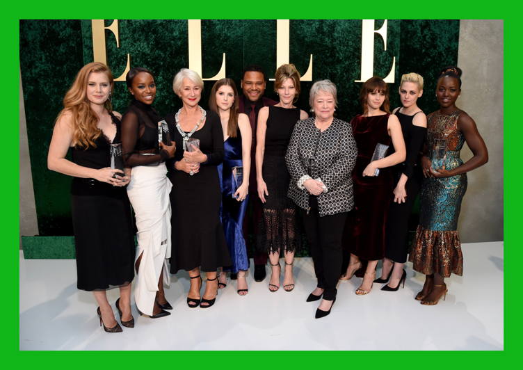 (L-R) Honoree Amy Adams, honoree Aja Naomi King, honoree Helen Mirren, honoree Anna Kendrick, host Anthony Anderson, ELLE Editor-in-Chief Robbie Myers, honoree Kathy Bates, honoree Felicity Jones, honoree Kristen Stewart, and honoree Lupita Nyong'o pose during the 23rd Annual ELLE Women In Hollywood Awards 