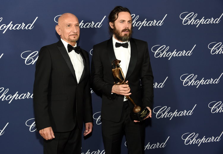 Casey Affleck poses with the Desert Palm Achievement Award and actor Ben Kingsley during the 28th Annual Palm Springs International Film Festival Film Awards Gala 