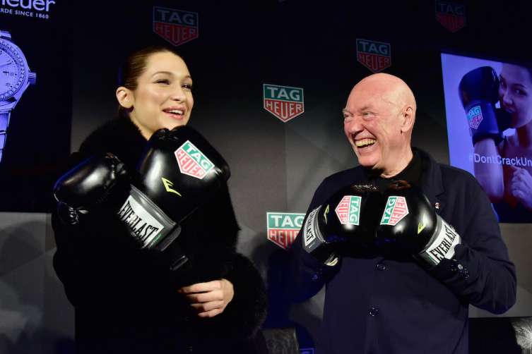 CEO of TAG Heuer Jean-Claude Biver (L) and Bella Hadid 