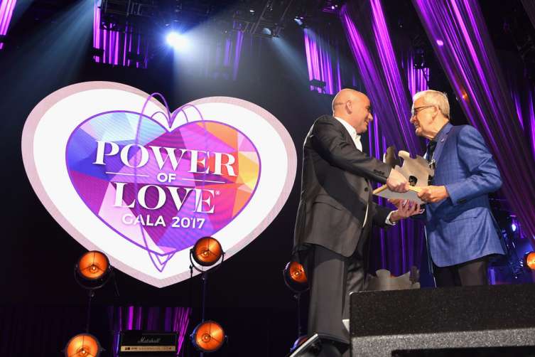  Former professional tennis player Andre Agassi (L) accepts the Community Achievement Award from Keep Memory Alive Co-Founder and Chairman Larry Ruvo during the 21st annual Keep Memory Alive "Power of Love Gala" benefit for the Cleveland Clinic Lou Ruvo Center for Brain Health honoring Ronald O. Perelman at MGM Grand Garden Arena on April 27, 2017 in Las Vegas, Nevada. 