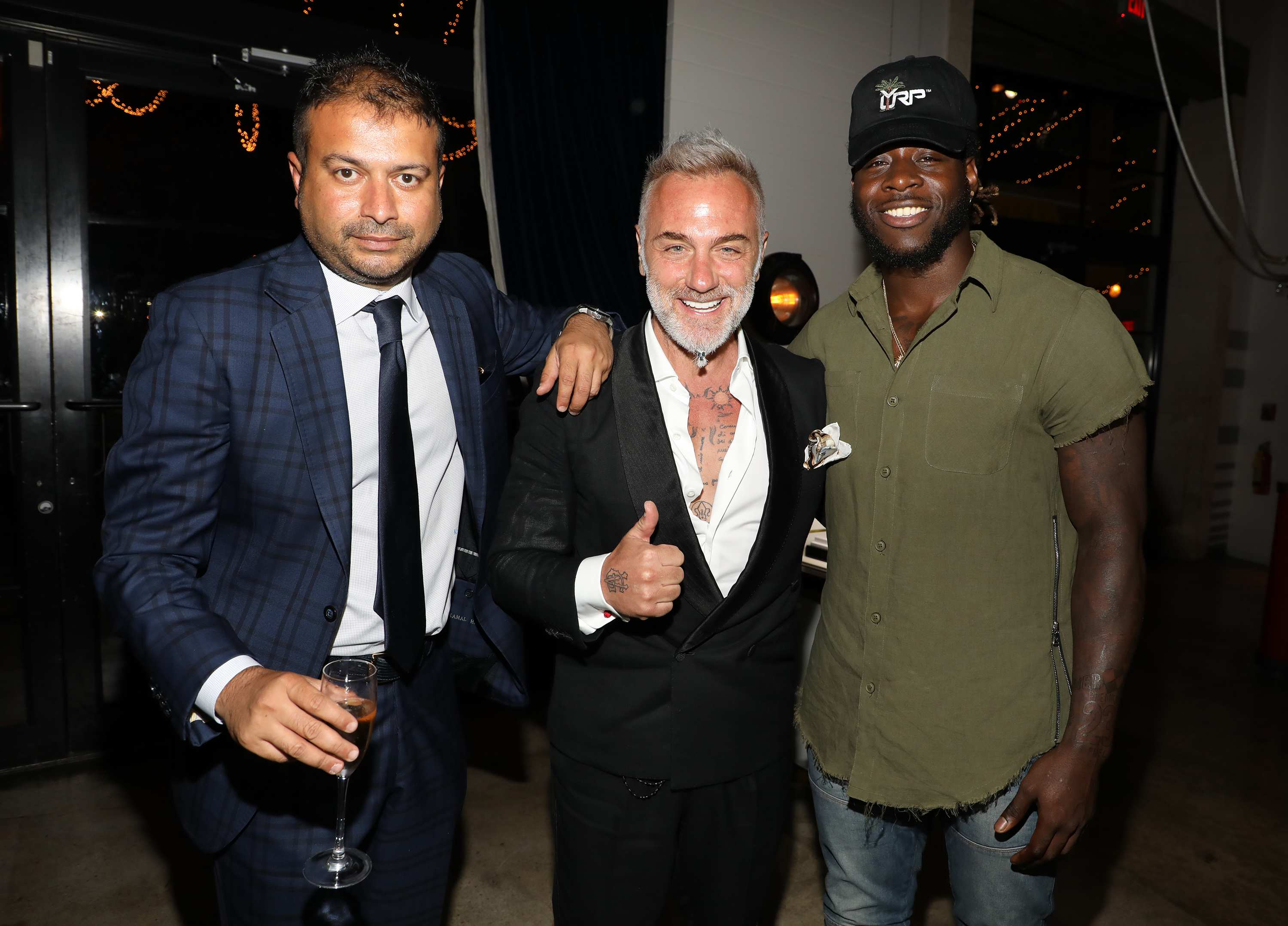 MIAMI, FL - APRIL 6: Kamal Hotchandani, Gianluca Vacchi and Jay Ajayi are seen at the Haute Living and Ulysse Nardin Collectors Dinner at Seaspice on April 6, 2017 in Miami, Florida. (Photo by Alexander Tamargo/Getty Images for Haute Living)