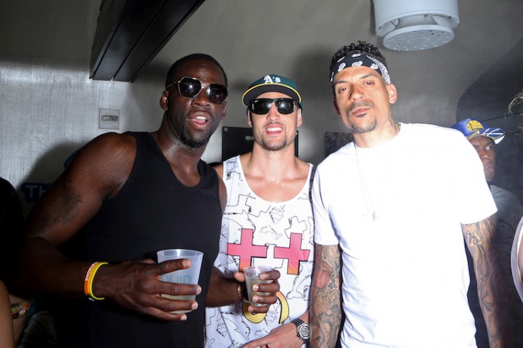 Draymond Green #23, Klay Thompson #11 and Matt Barnes #22 of the Golden State Warriors attend a NBA championship celebration at the Liquid Pool Lounge at the Aria.
