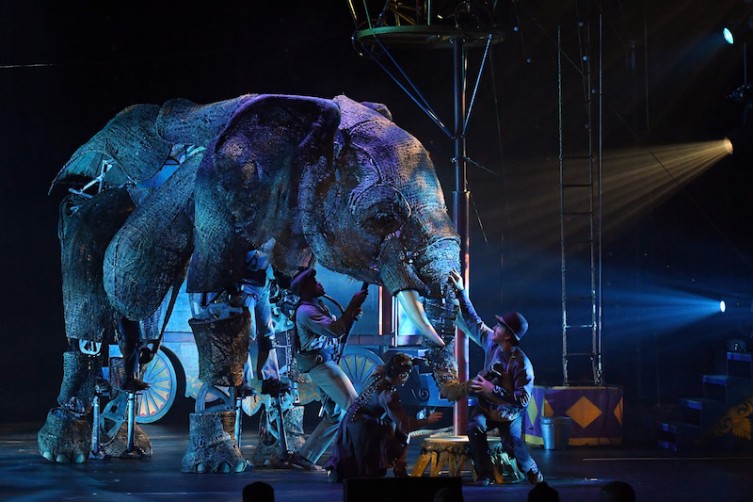 Puppeteers and cast members perform with an elephant puppet named Queenie during the opening night of "Circus 1903" at Paris Las Vegas.