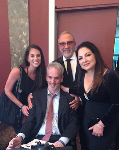 Ashley Fern of Haute Living, her father and former Miami Project Patient Keith Fern, and Gloria & Emilio Estefan