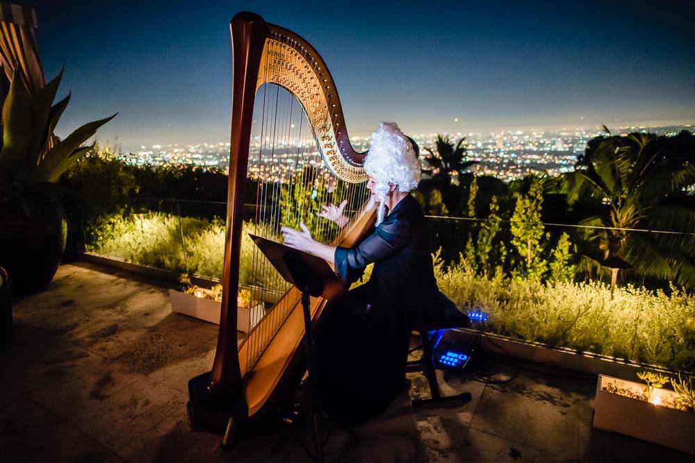 A harpist performs at The Supper Club's recent Halloween party in Los Angeles
